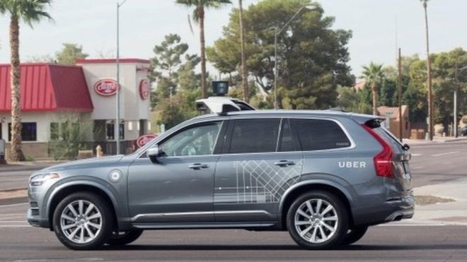 Uber halts self-driving car tests after death